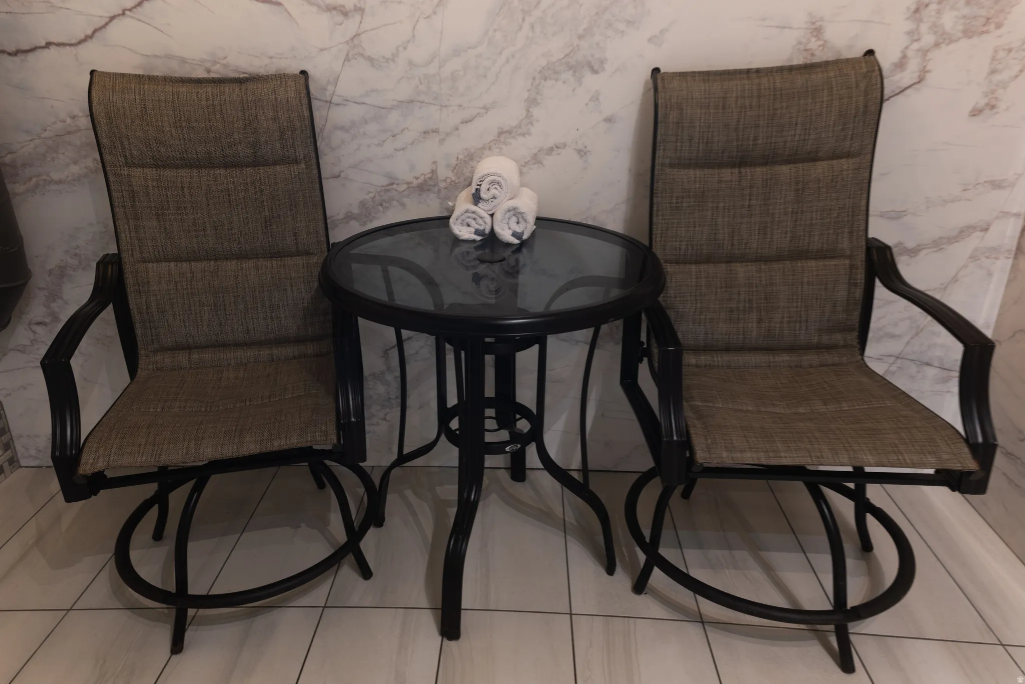 Sitting room with light tile patterned flooring