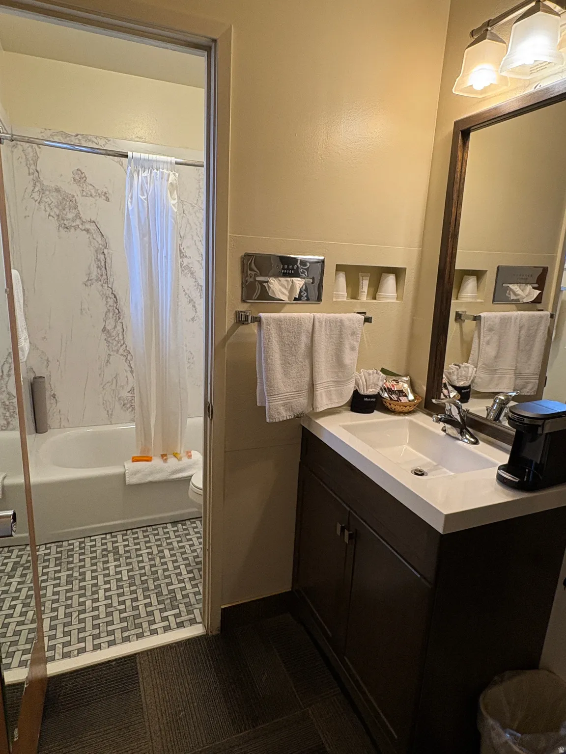 Full bathroom with vanity and shower / tub combo with curtain