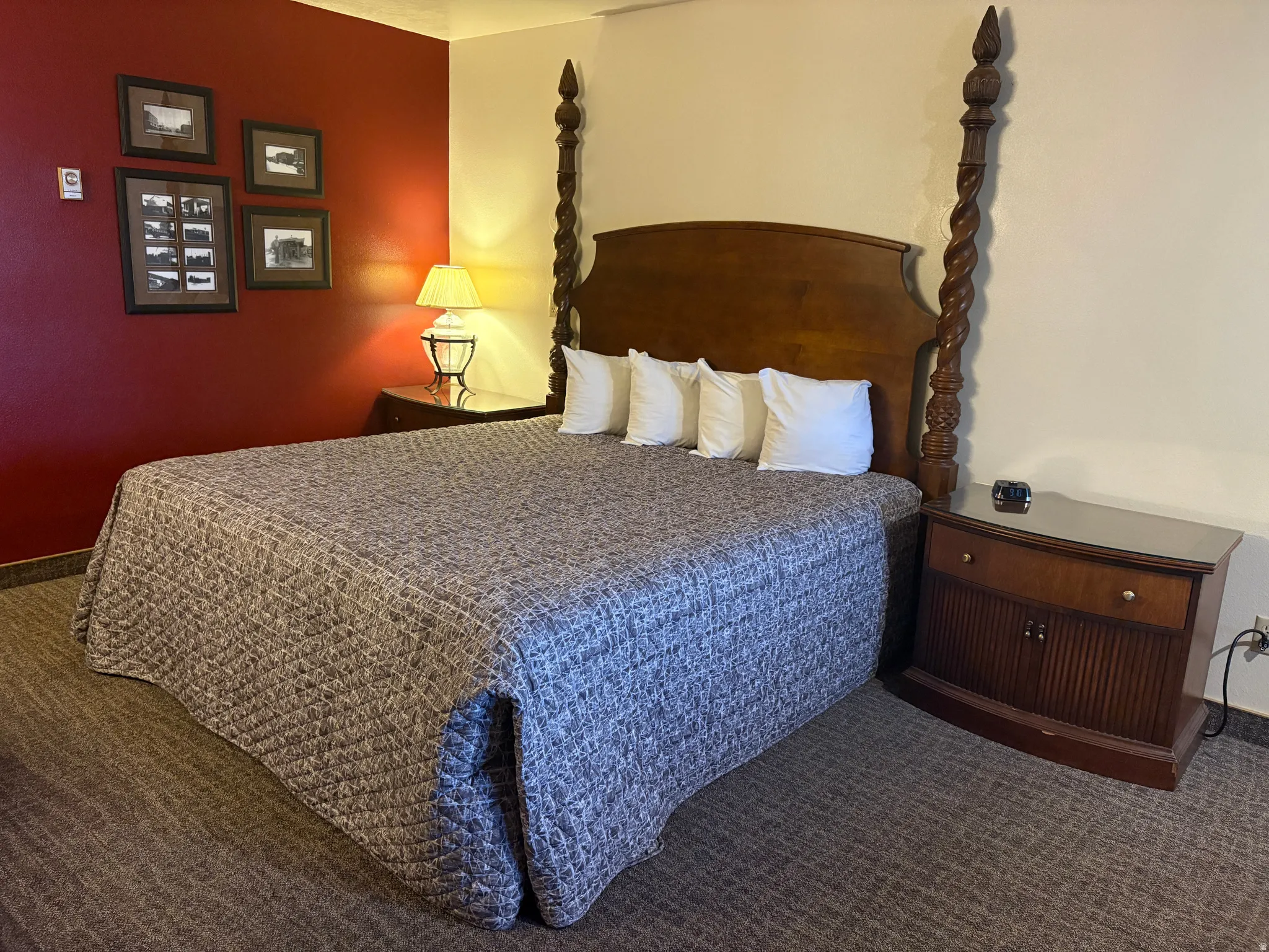 Bedroom featuring dark carpet