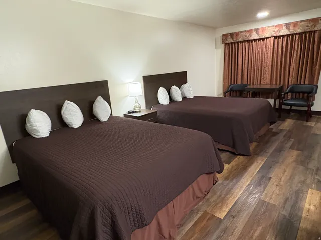 Bedroom featuring dark wood-style flooring