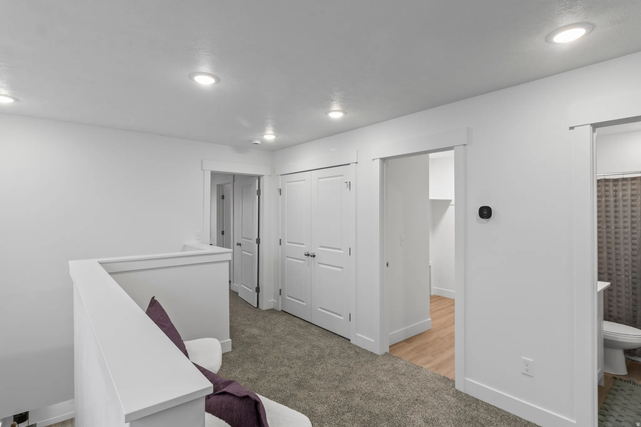 Unfurnished office with light colored carpet and recessed lighting