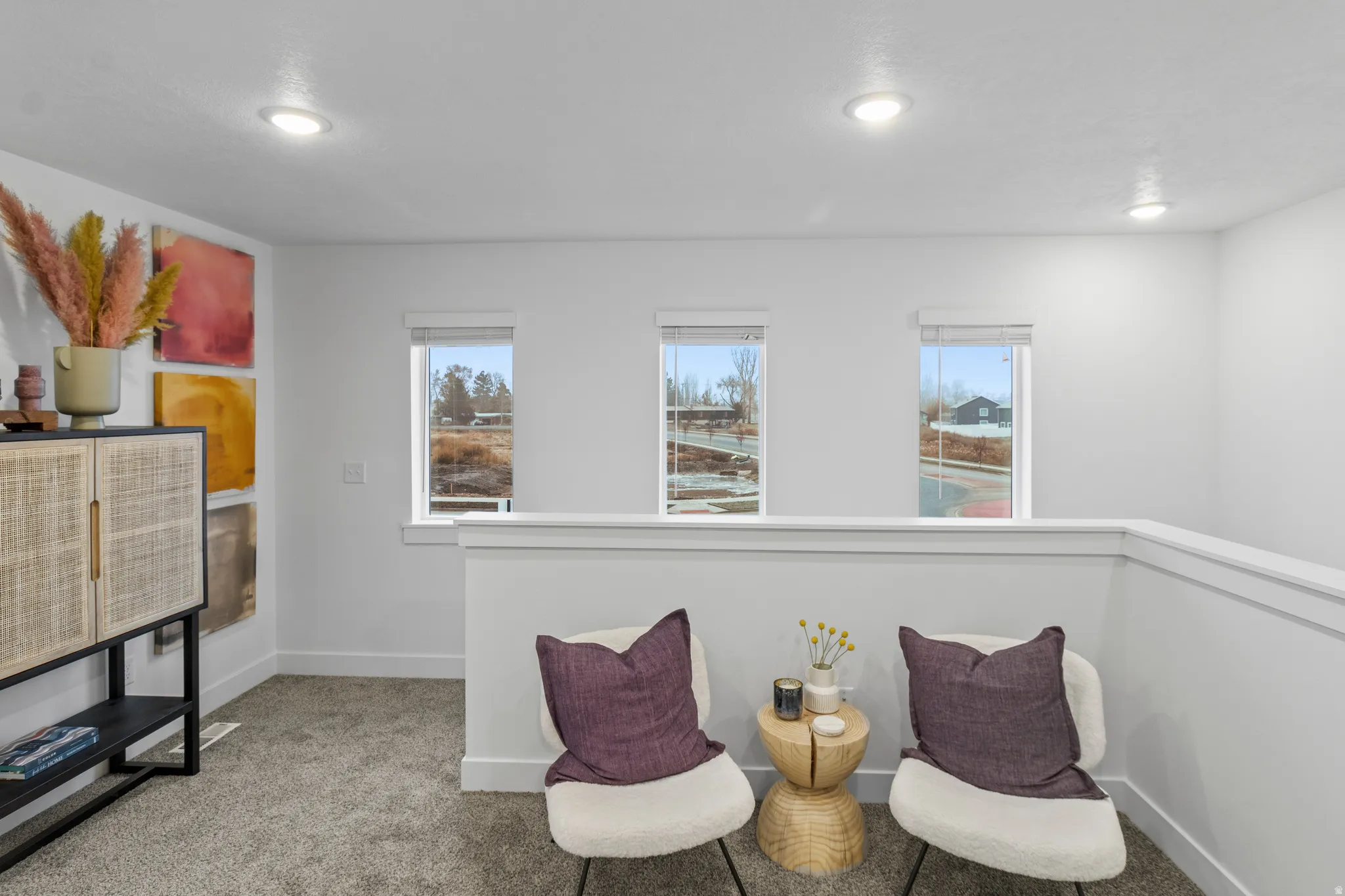 Living area with carpet flooring