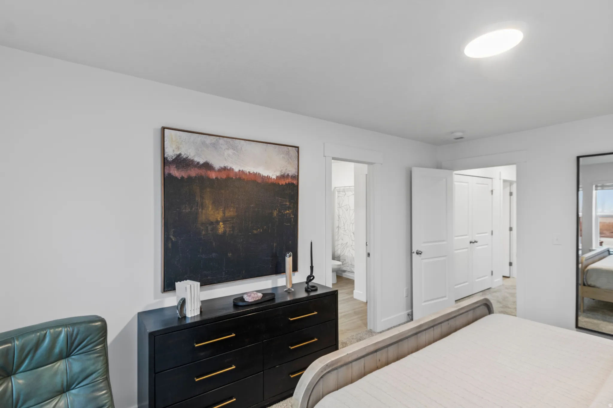 Bedroom featuring ensuite bath