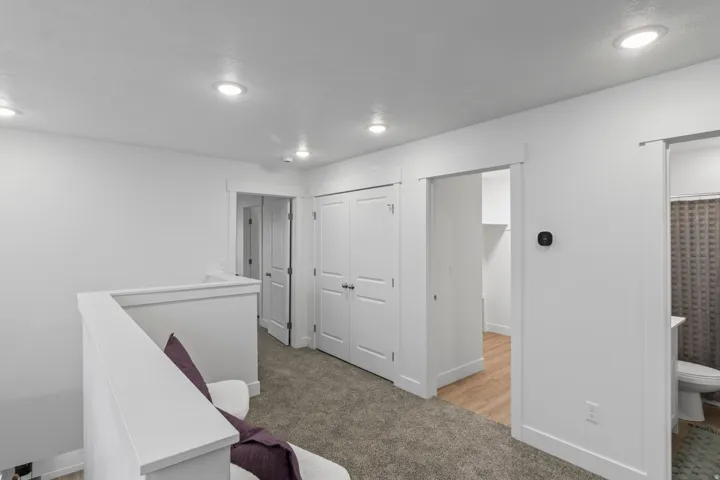 Unfurnished office with light colored carpet and recessed lighting