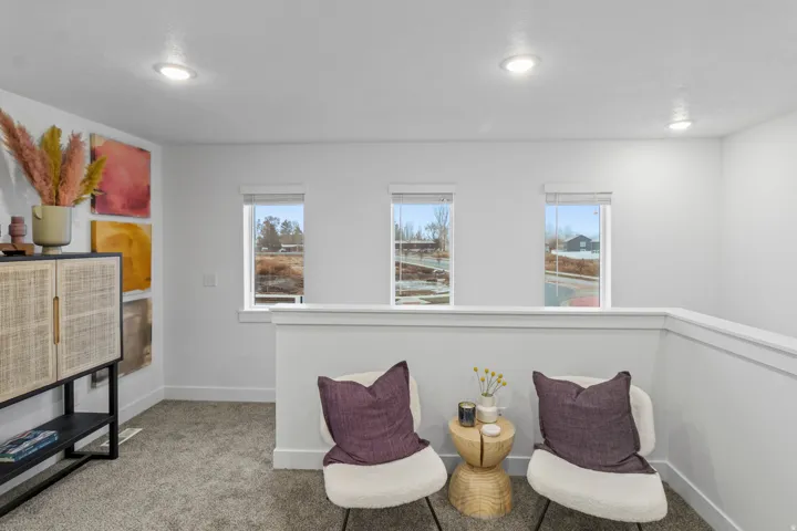 Living area with carpet flooring