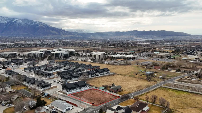 Aerial overview of property's location featuring property parcel outlined and mountains