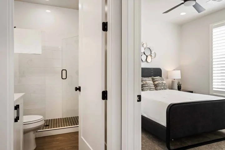Bedroom featuring dark wood finished floors, recessed lighting, and ceiling fan