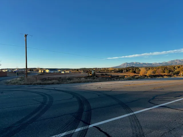 View of asphalt street with a mountain view