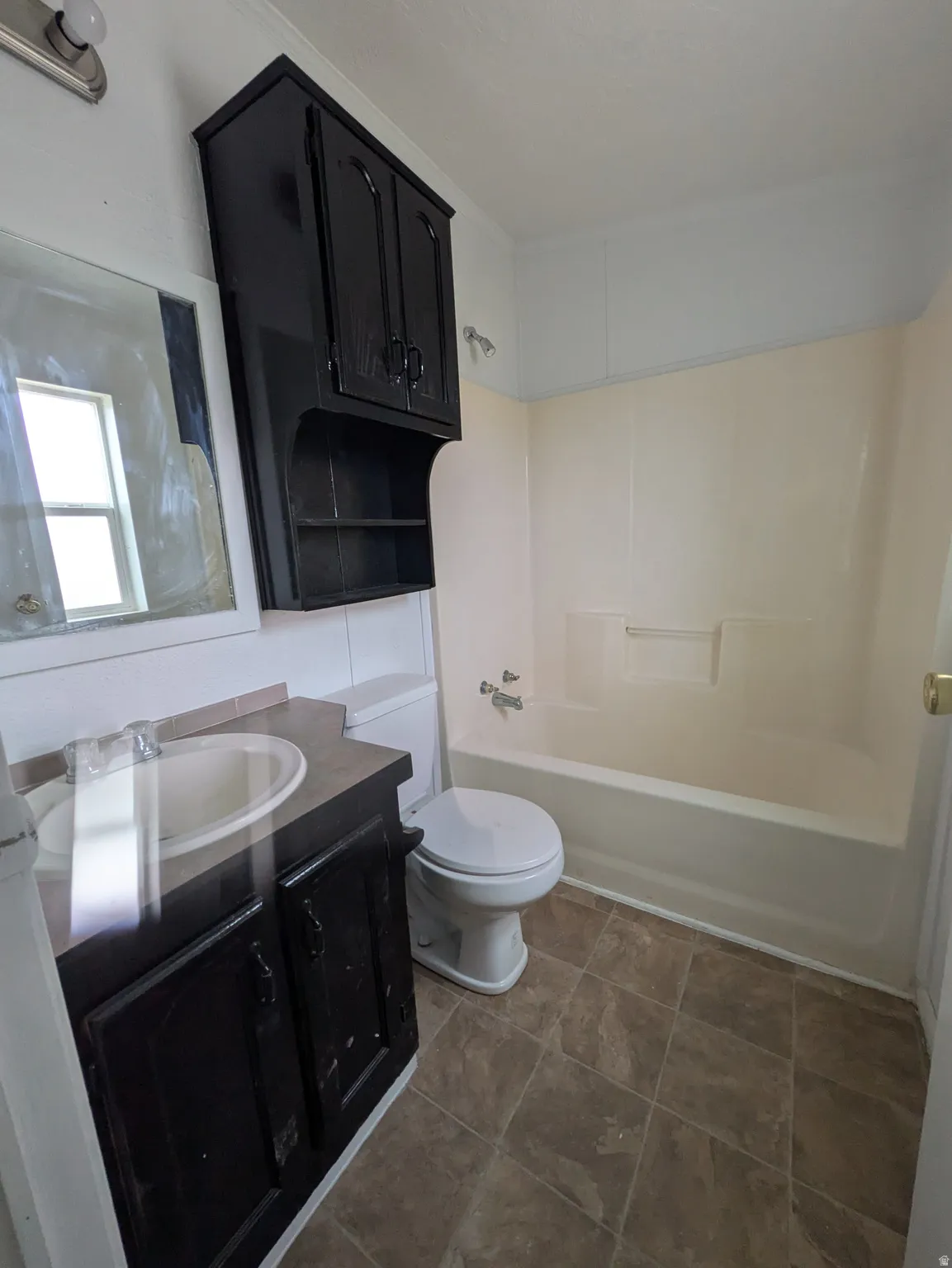 Full bathroom with vanity and tub / shower combination
