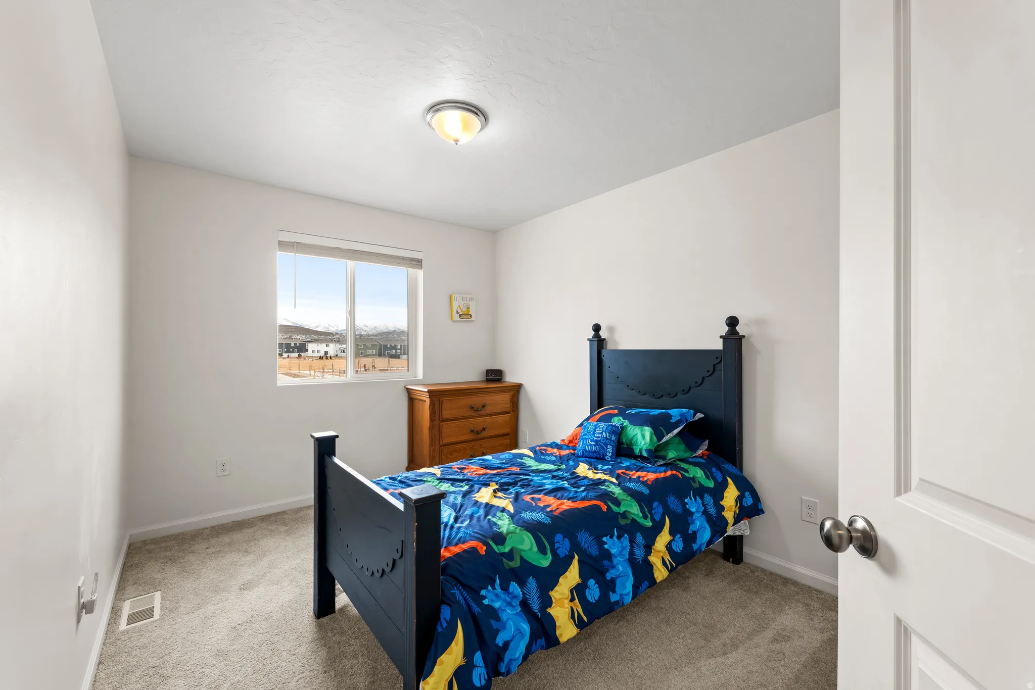 Bedroom with carpet