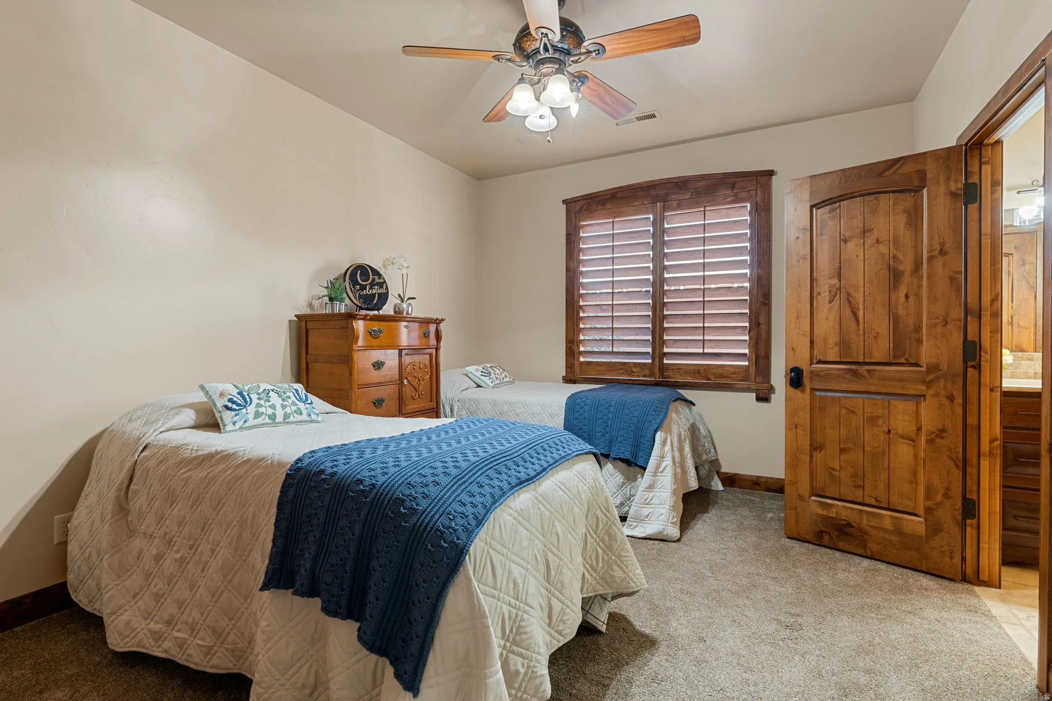 bedroom #2 with a ceiling fan and baseboards