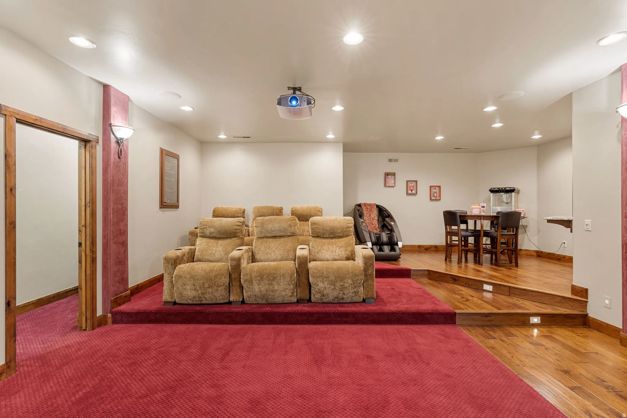 Home theater featuring recessed lighting and hardwood / wood-style floors