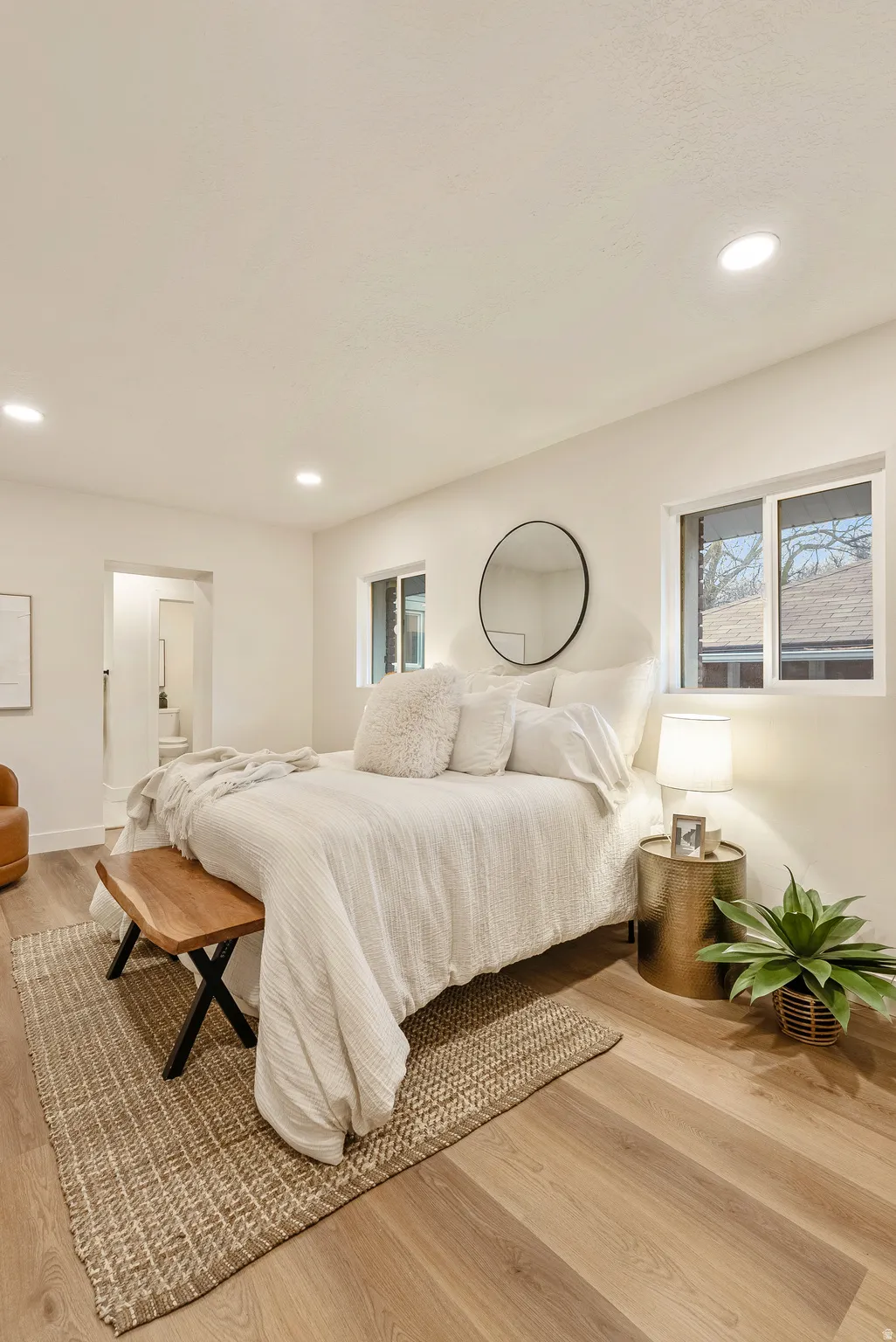 Bedroom featuring light wood-style floors and recessed lighting