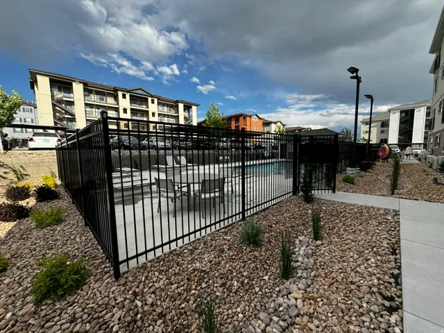 Community pool featuring a patio area