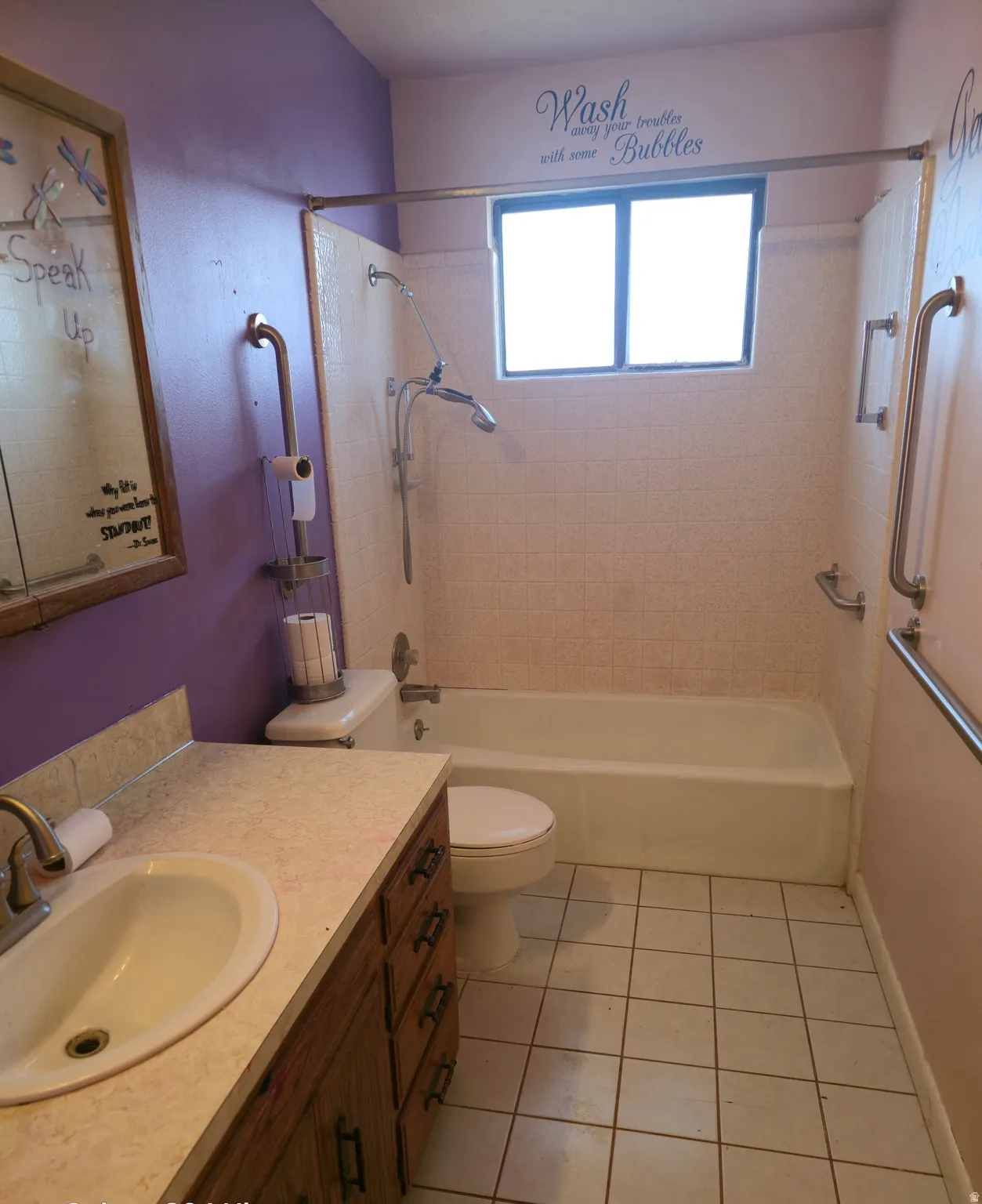 Full bathroom with  shower combination, vanity, and light tile patterned floors