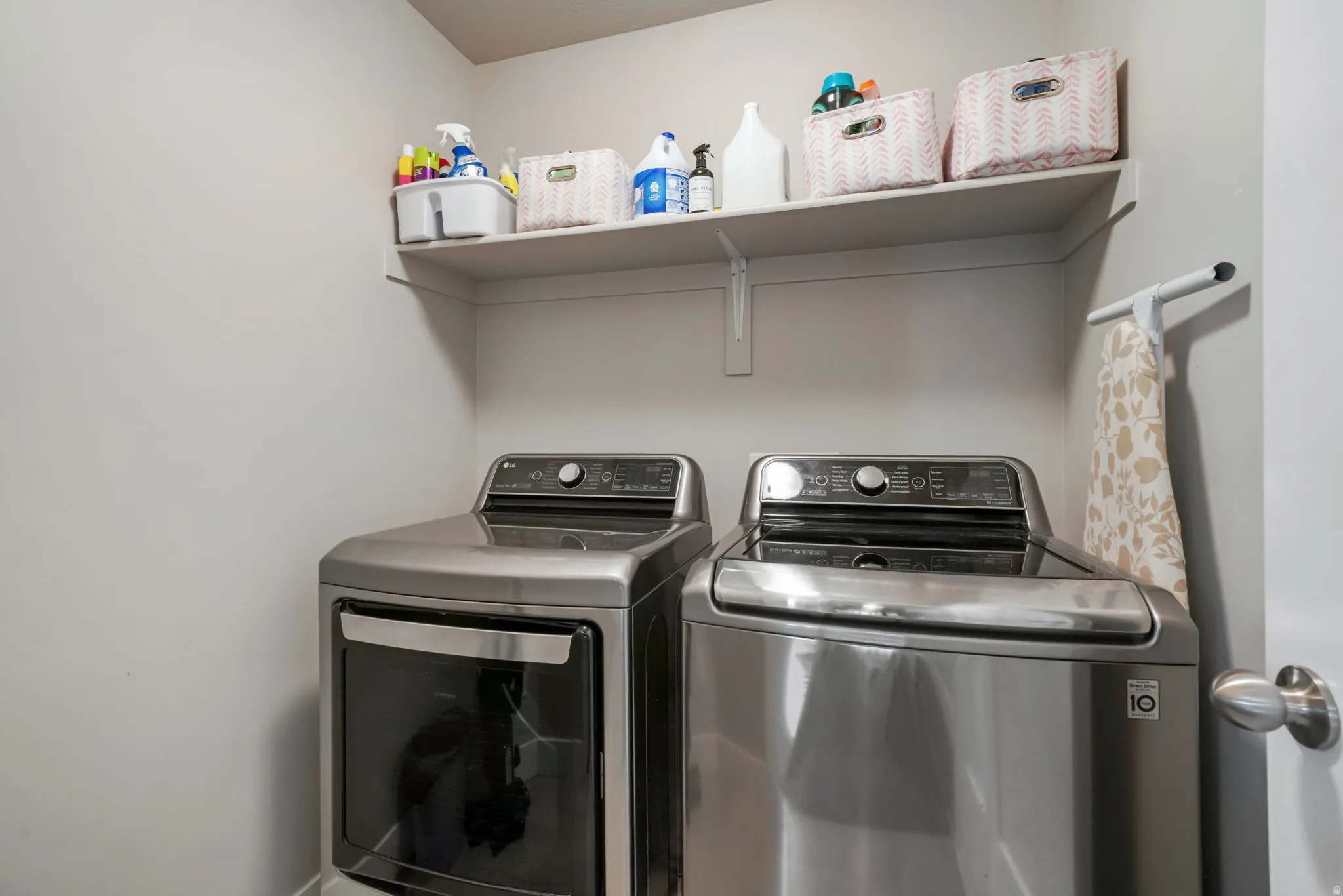 Laundry area featuring separate washer and dryer