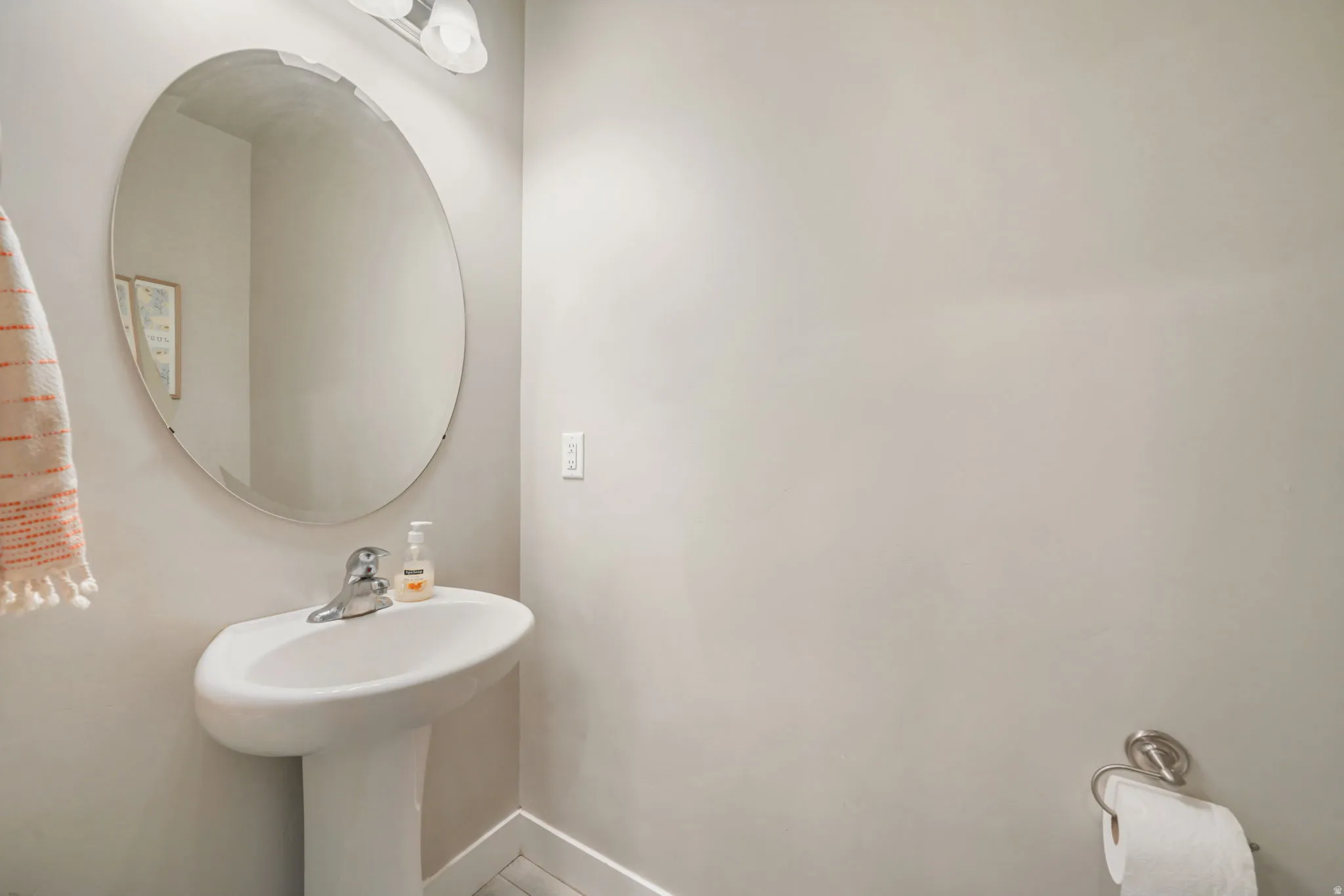 Bathroom featuring baseboards