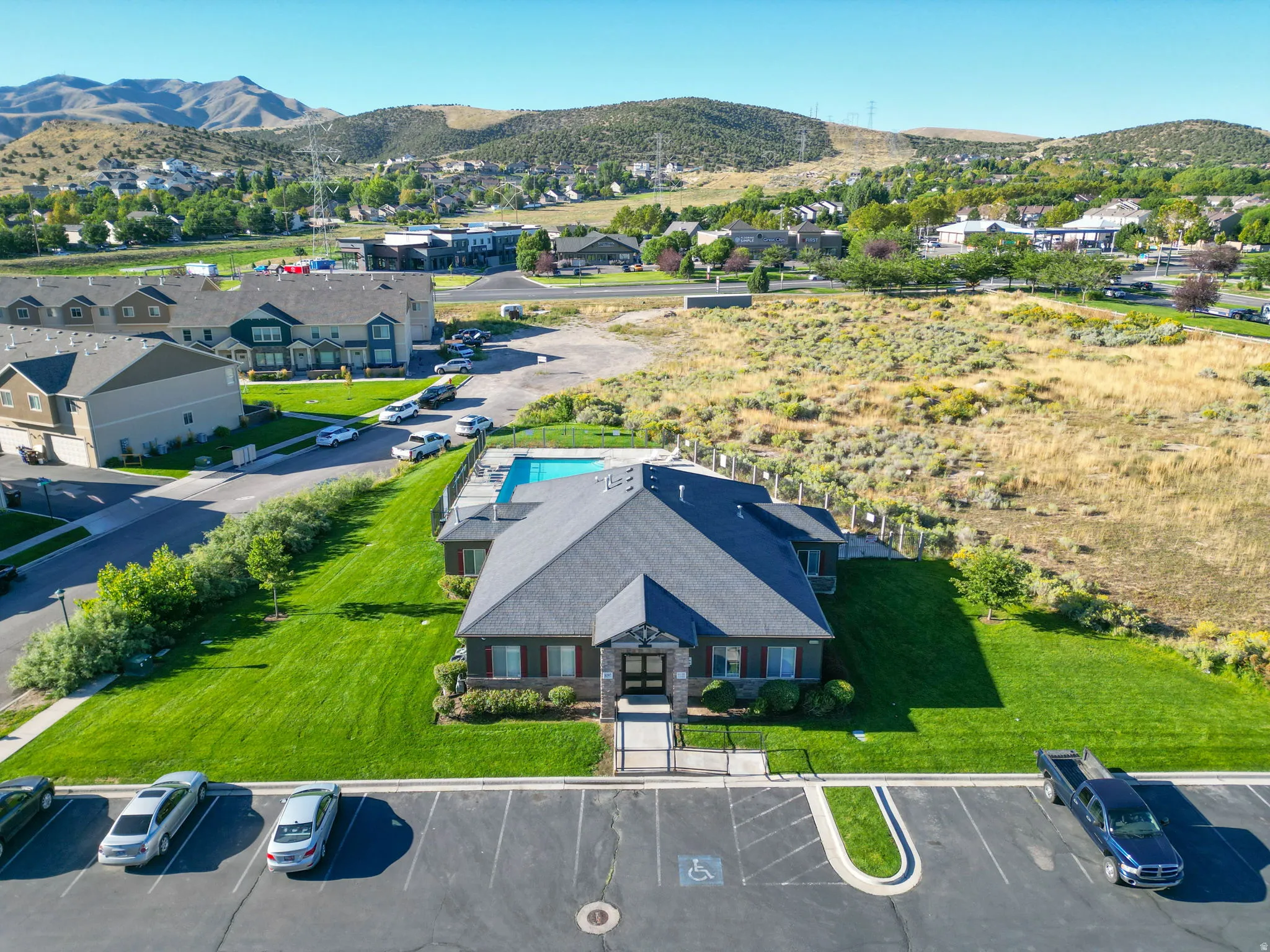 Aerial view of residential area with a mountain backdrop