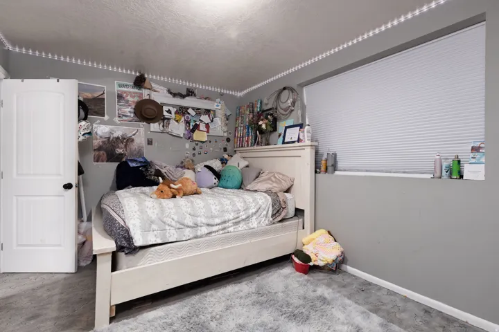 Bedroom featuring baseboards