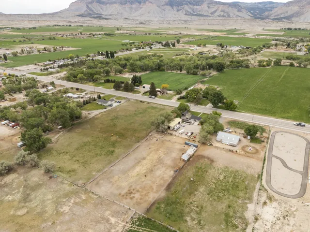 Overview of rural landscape featuring a mountainous background