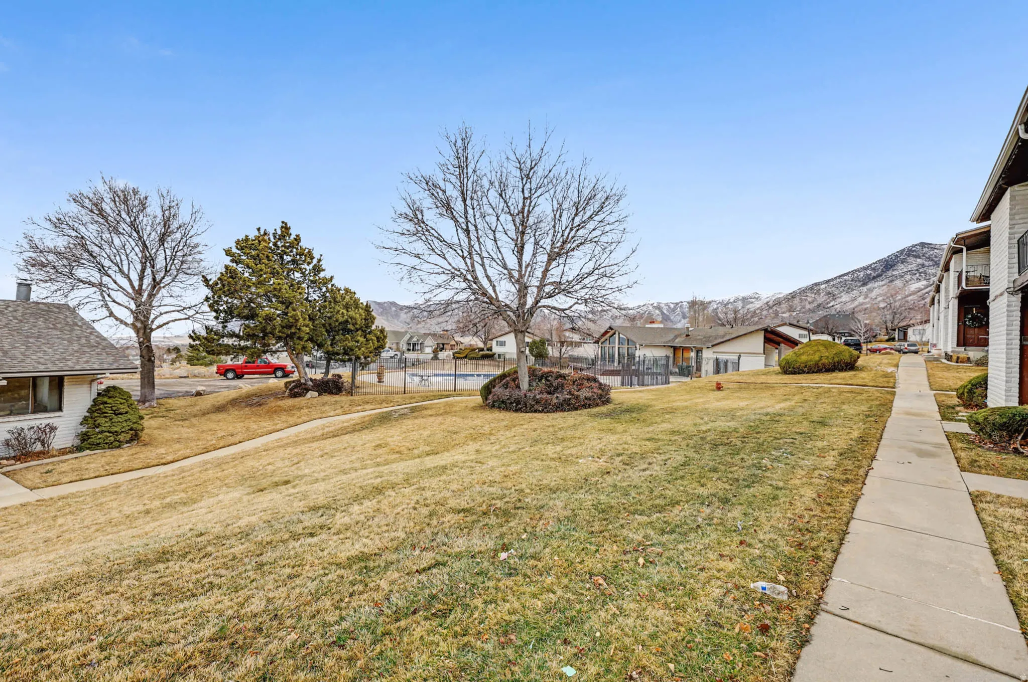 View of yard with a mountain view and a residential view