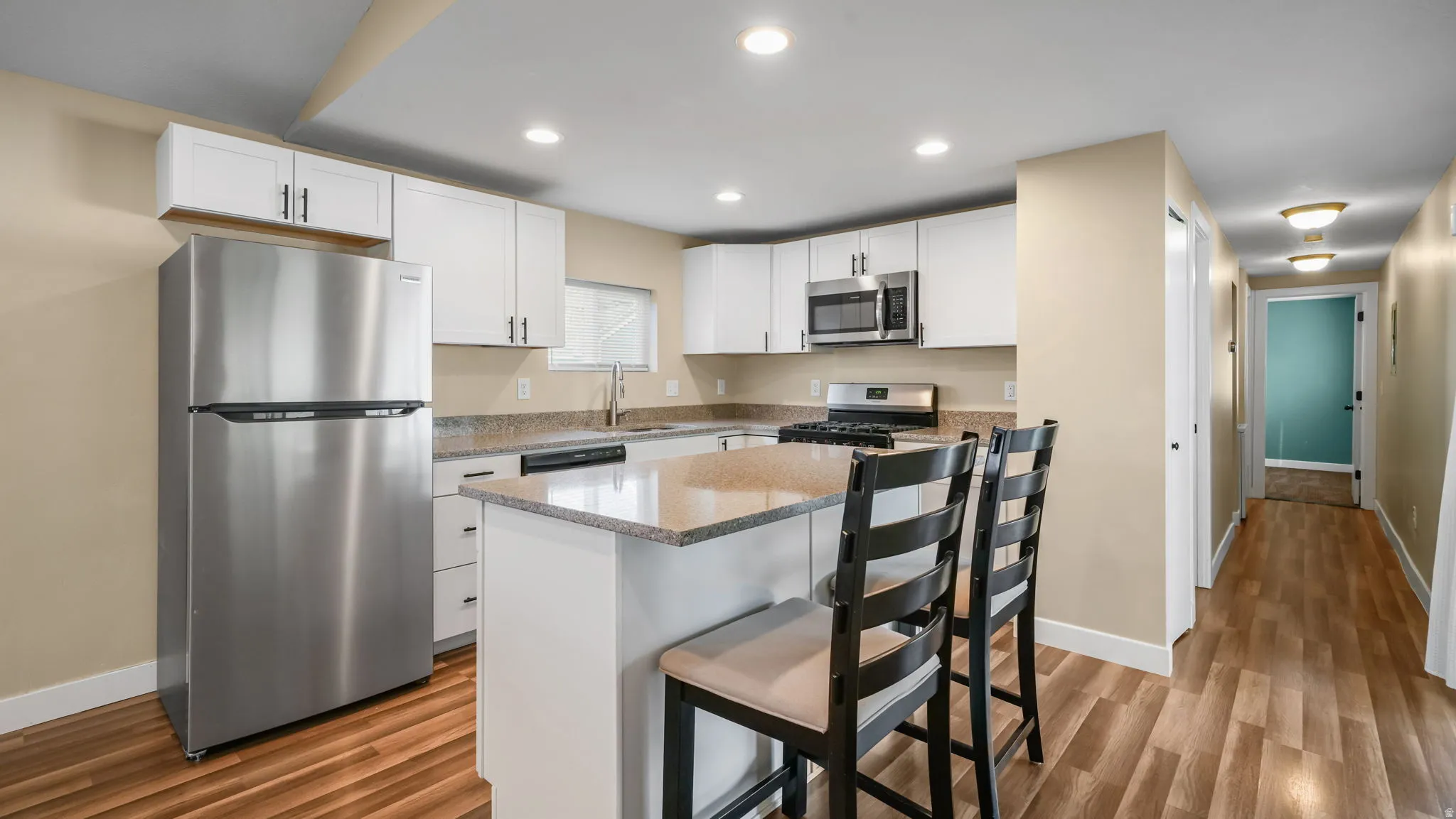 Fully updated home features a bright, open-concept kitchen designed for both style and function.
