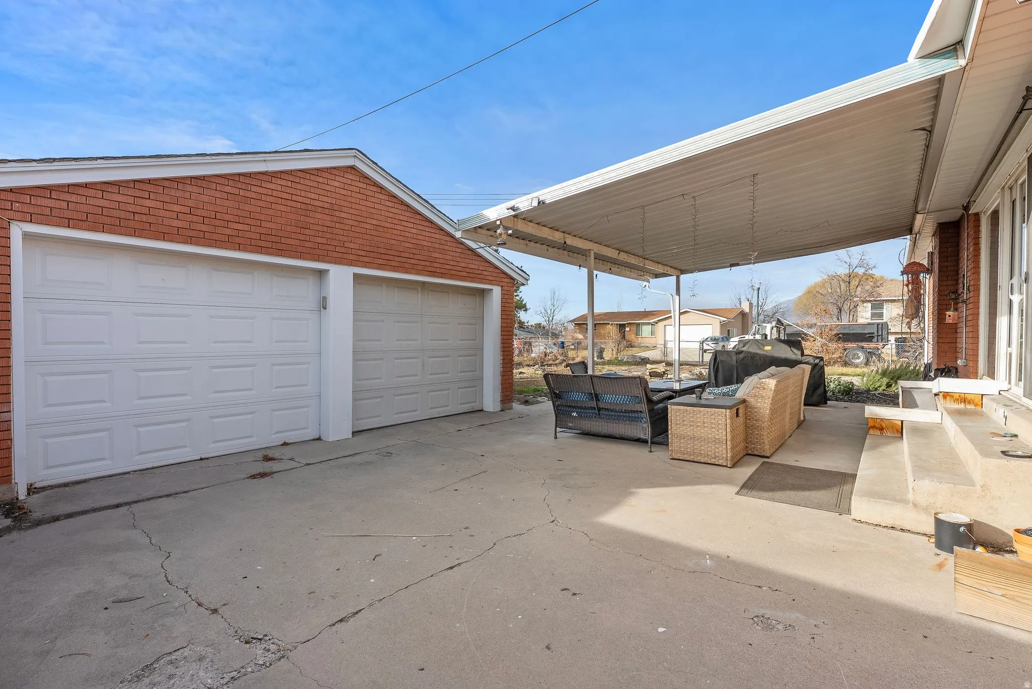 Detached garage with a residential view