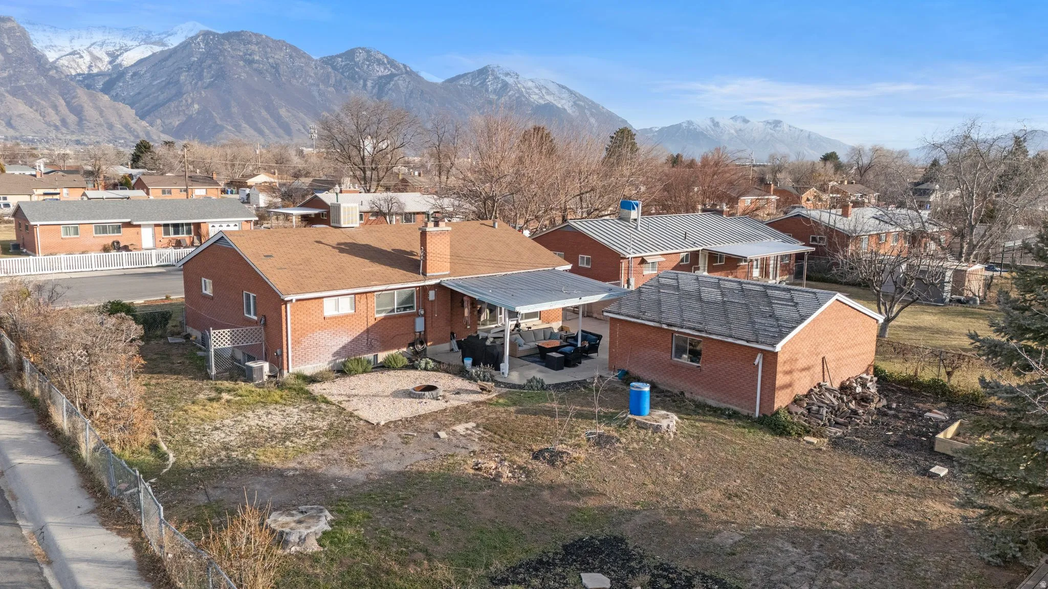 Aerial view of residential area with mountains