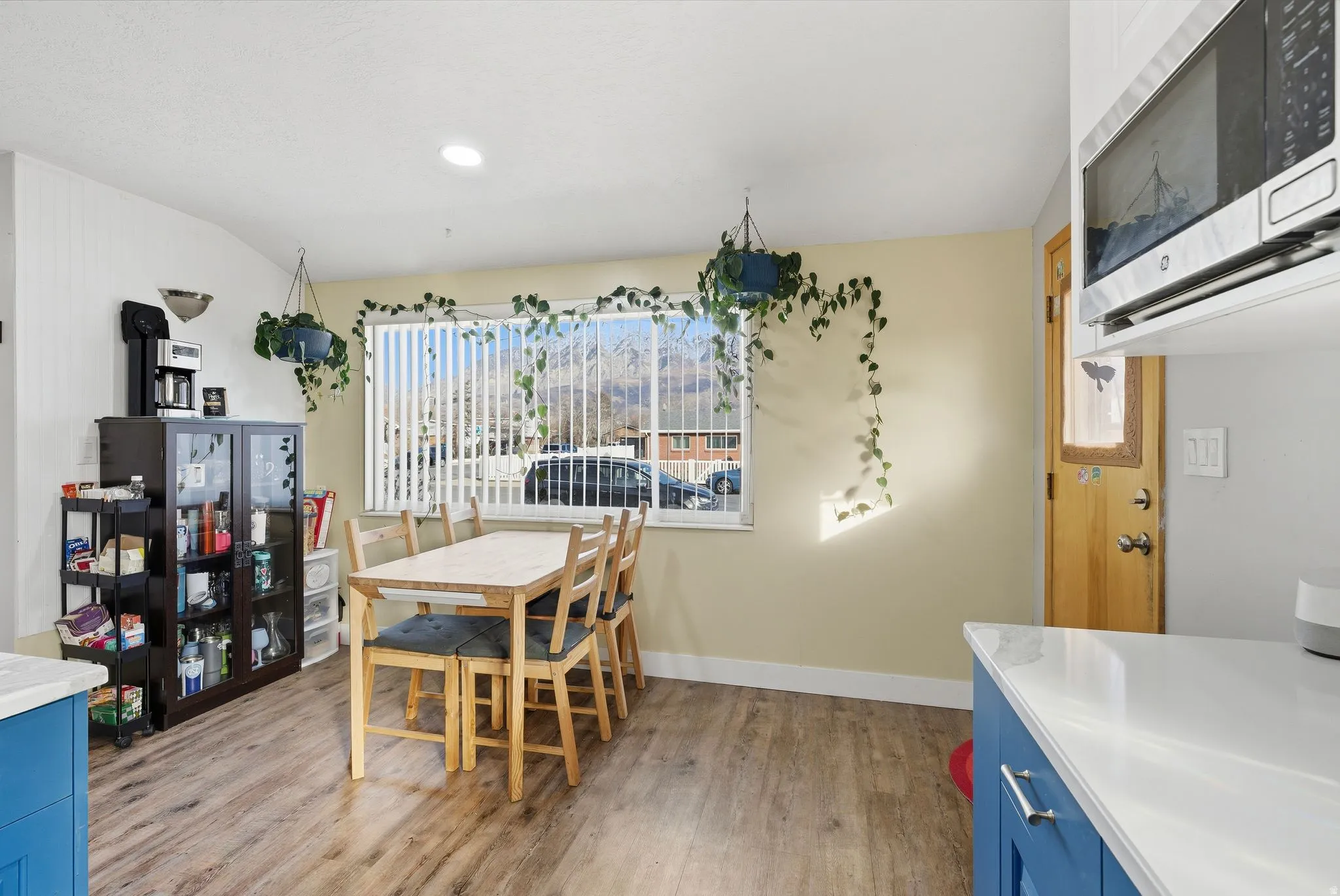 Dining room featuring light wood-style flooring and recessed lighting