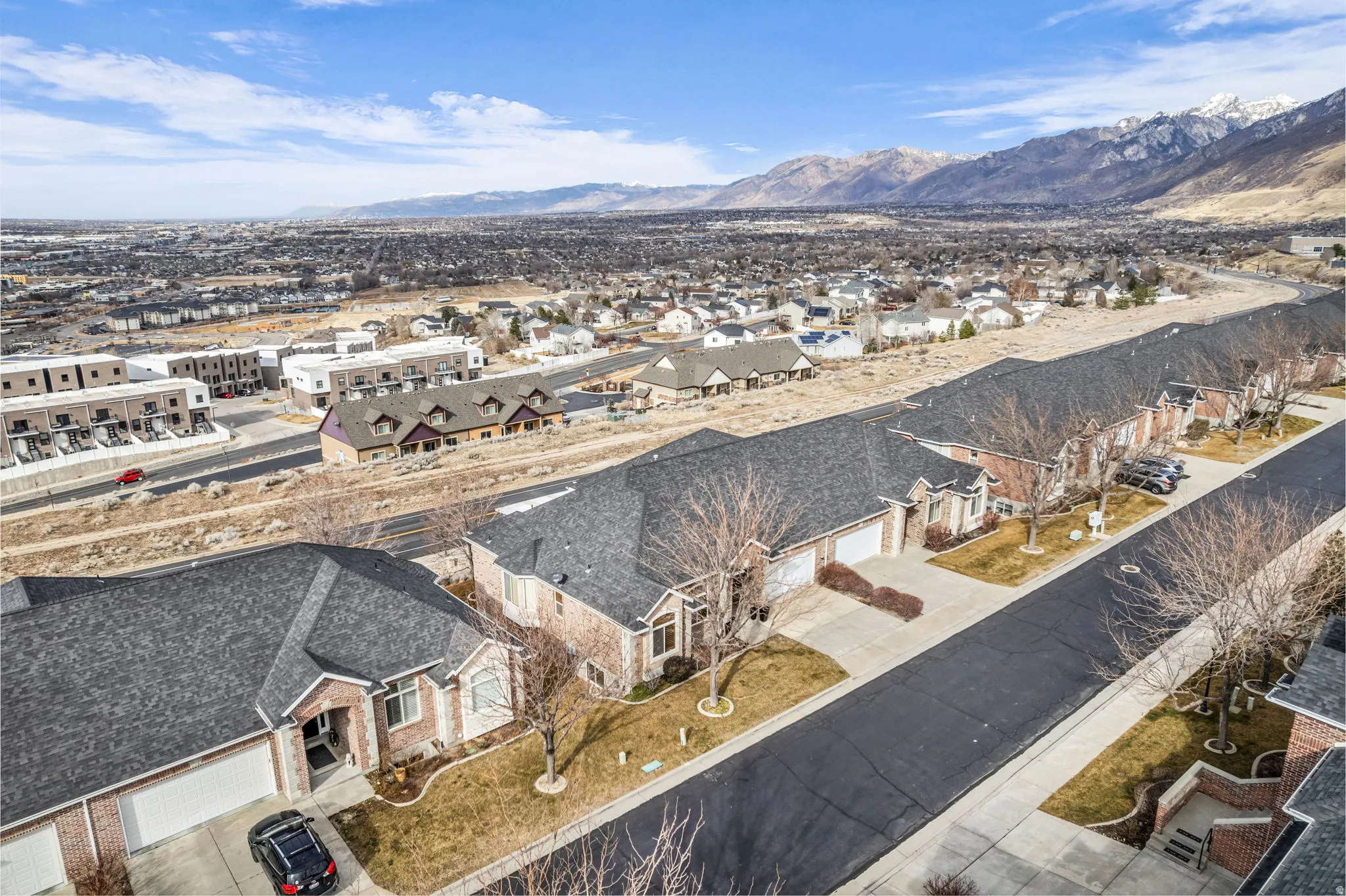 Aerial view of residential area with mountains