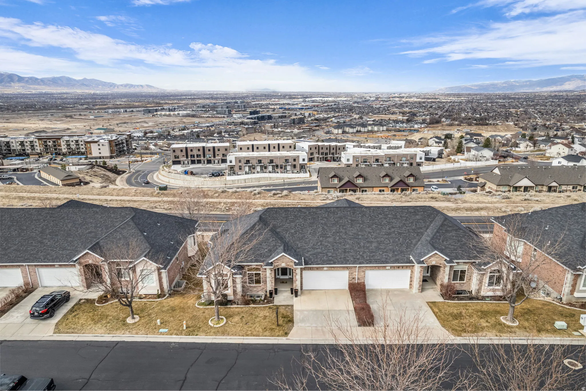 Aerial perspective of suburban area featuring mountains