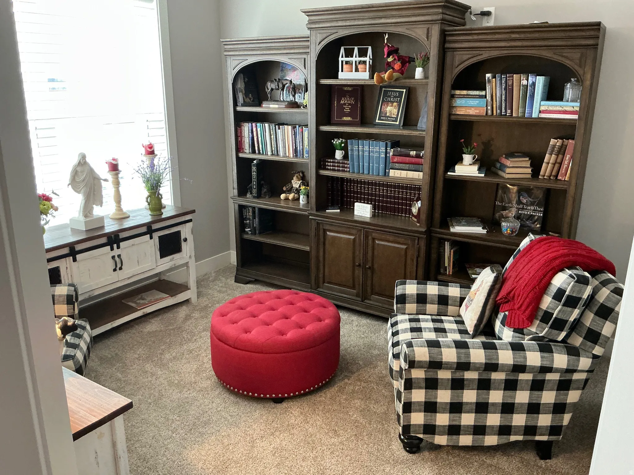 Living area featuring light carpet