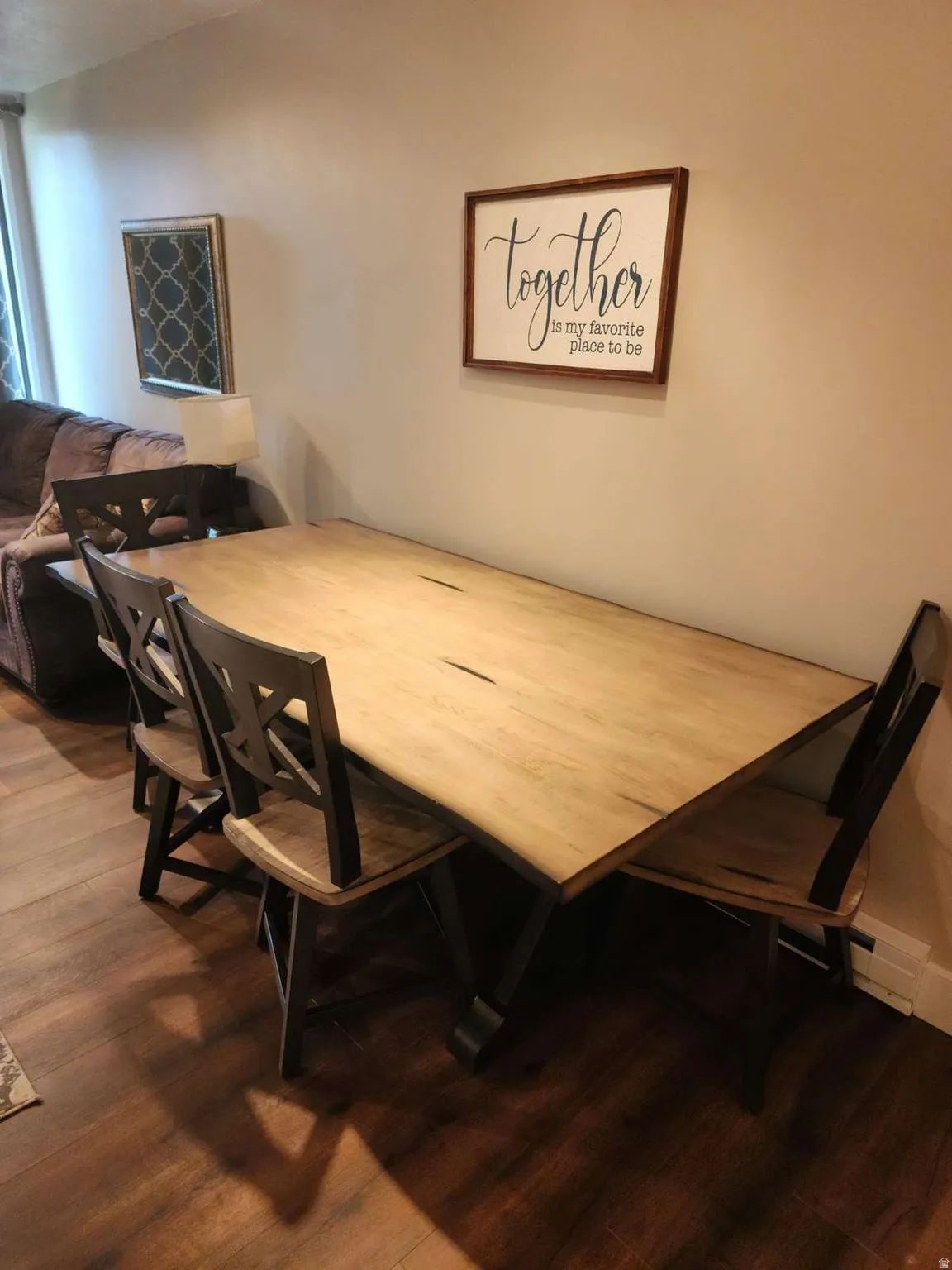 Dining area with wood finished floors