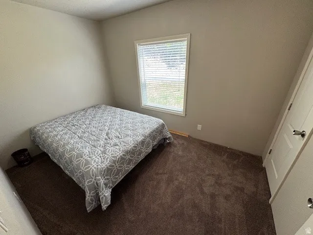 Bedroom with carpet floors