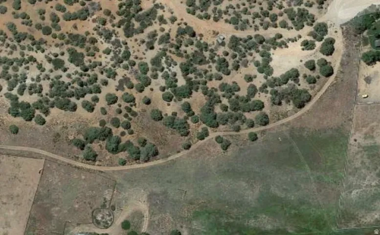 View of rural area featuring a desert landscape and property boundaries highlighted