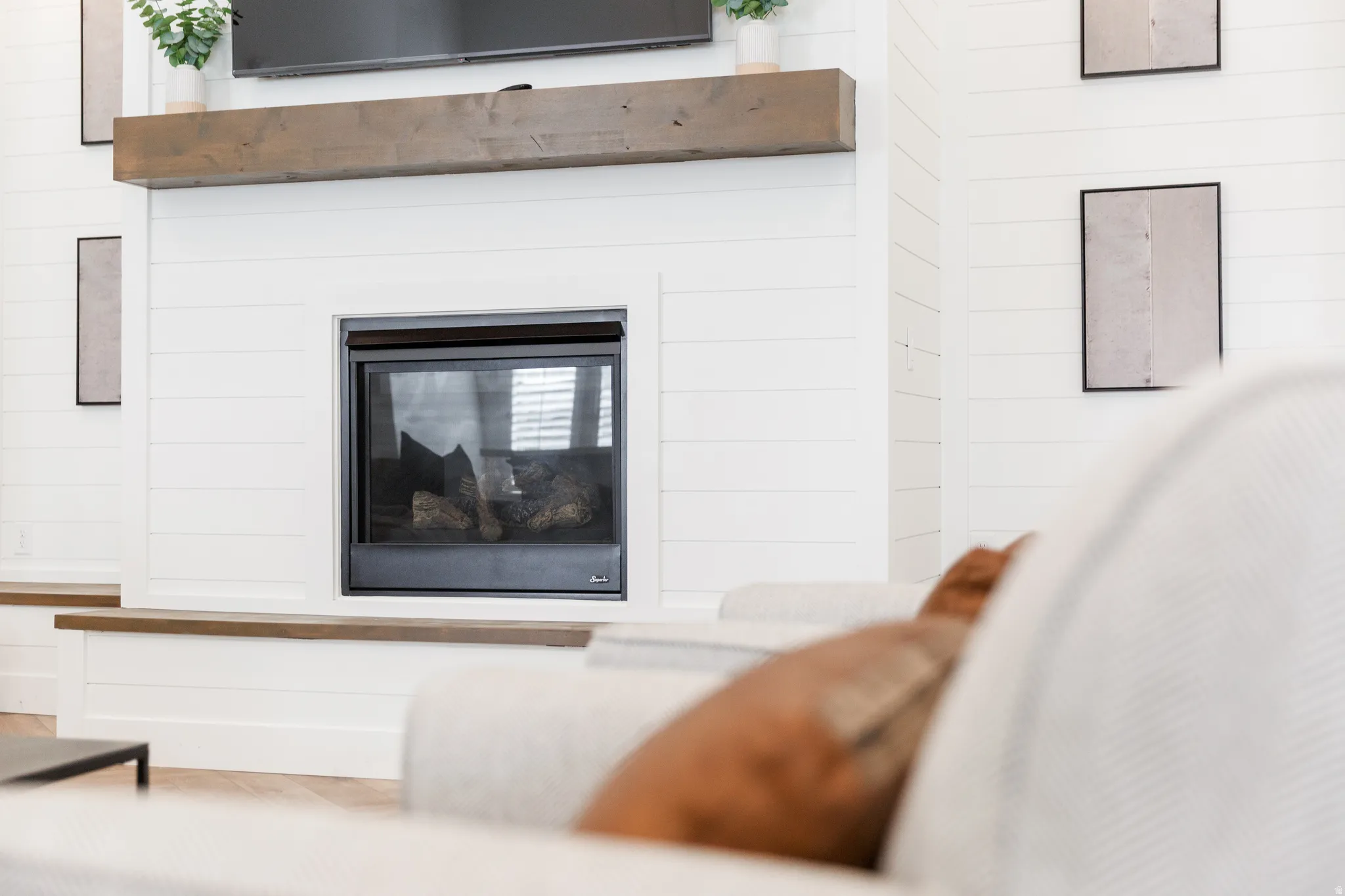 Detailed view of a glass covered fireplace