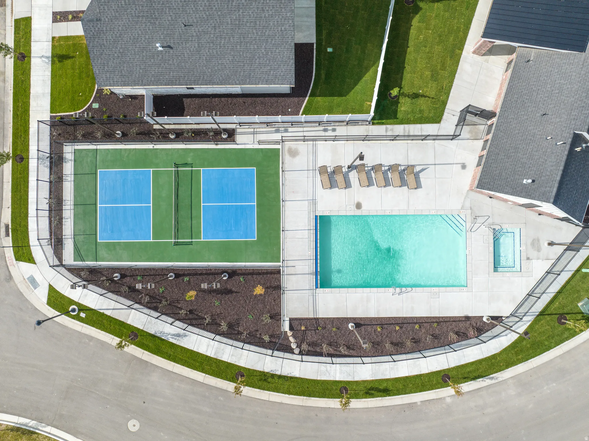 Drone / aerial view of a pool area