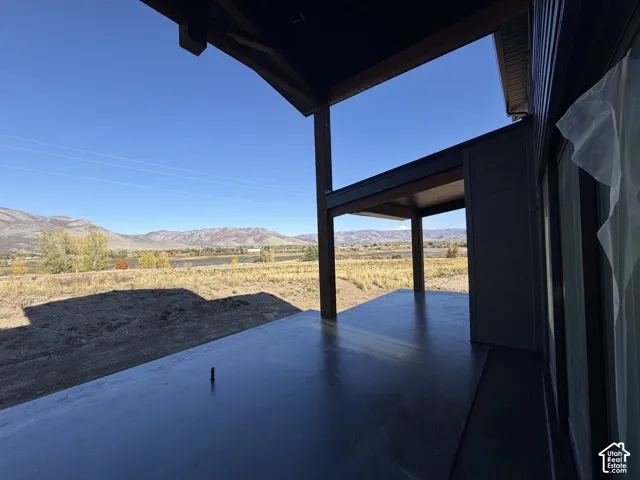 Expansive outdoor patio with concrete flooring