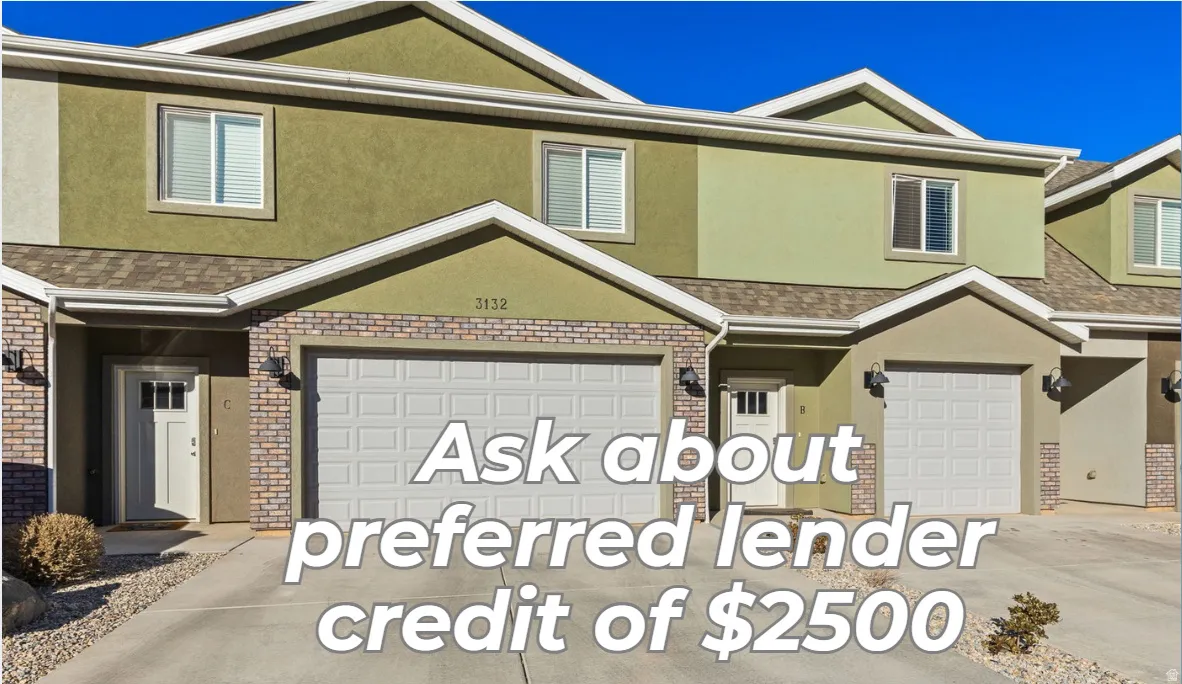 View of front of house with brick siding, stucco siding, driveway, and a shingled roof