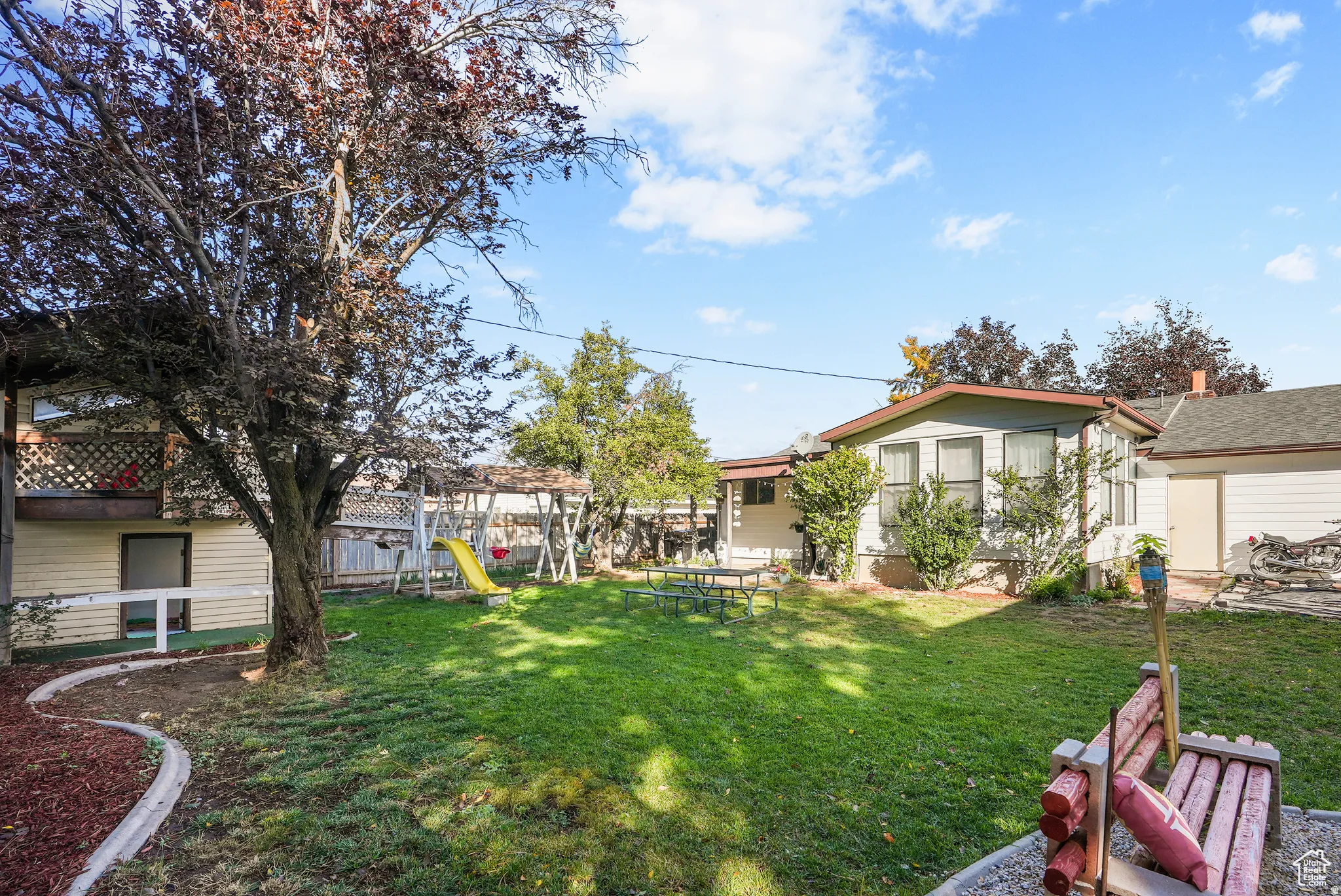 View of yard featuring a playground