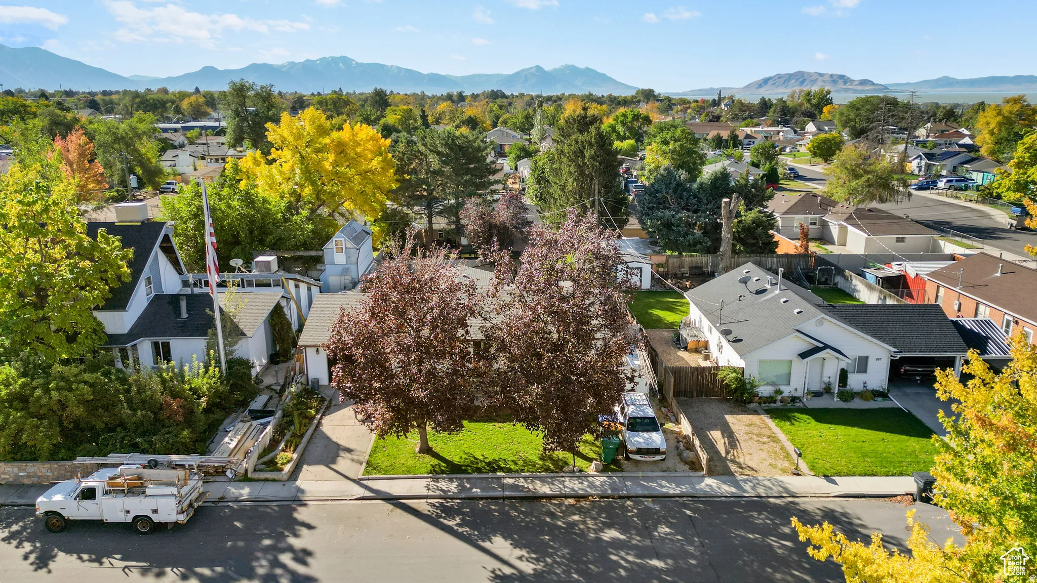 Aerial view of residential area featuring mountains