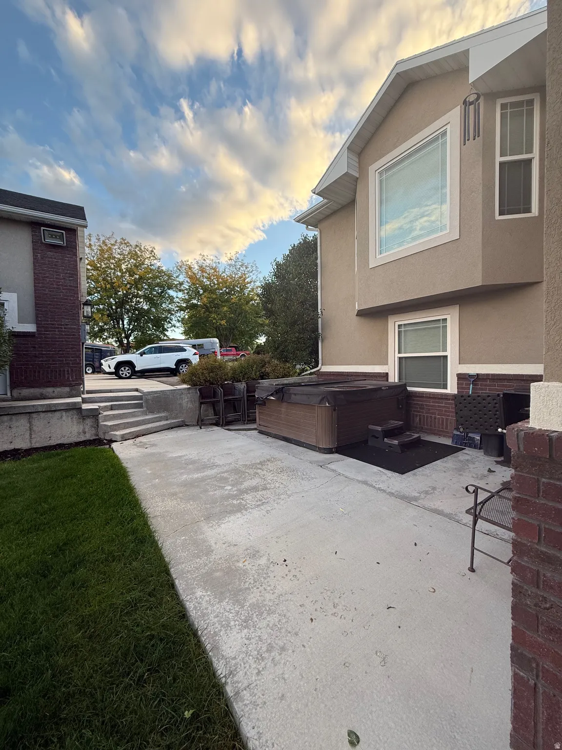 View of patio / terrace featuring a hot tub
