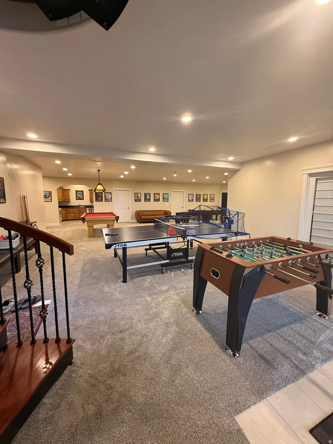 Rec room featuring recessed lighting, pool table, and light colored carpet