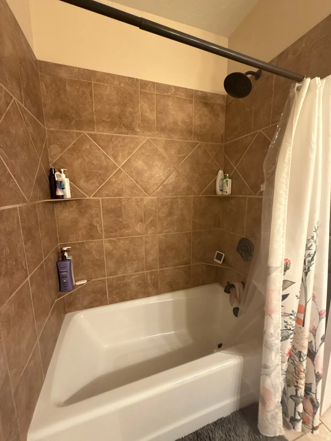 Bathroom featuring shower / bath combo