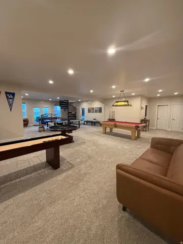 Game room featuring billiards and recessed lighting