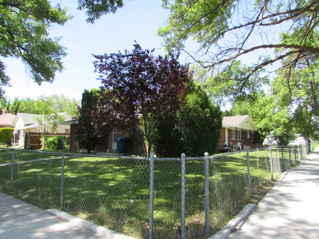 View of front of property with a fenced front yard