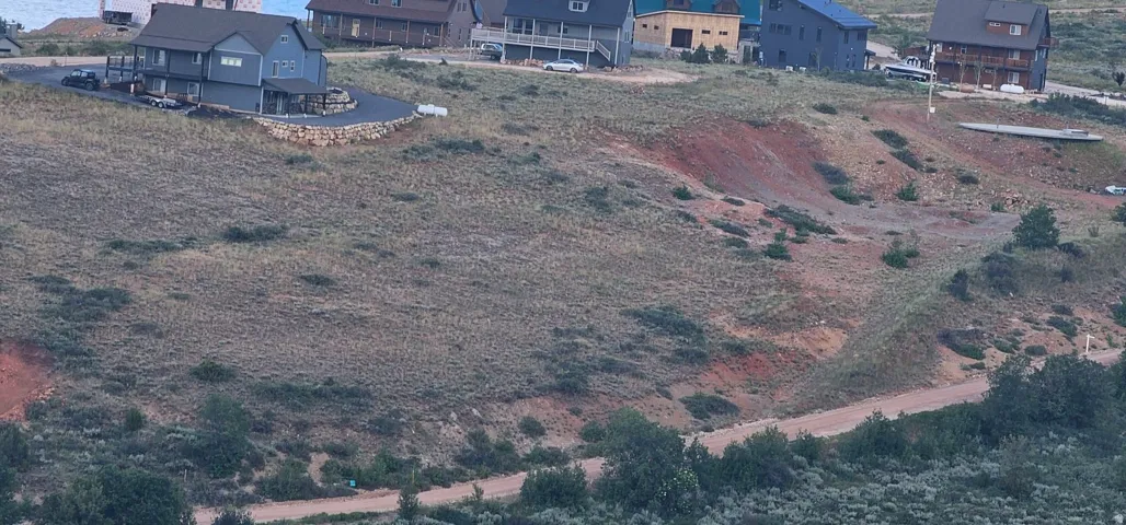 Expansive hillside property featuring natural vegetation and undeveloped terrain