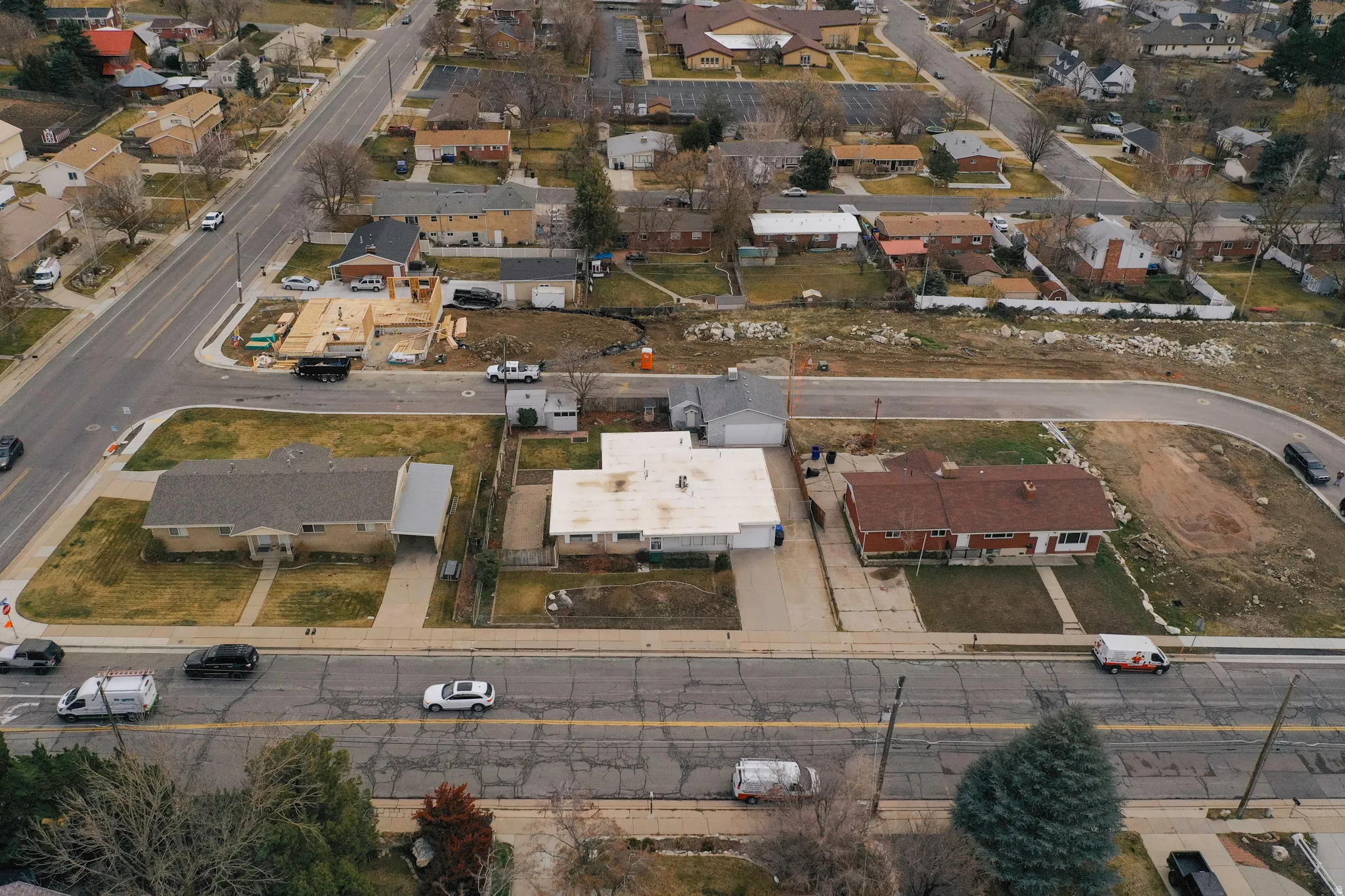 Aerial overview of property's location featuring nearby suburban area