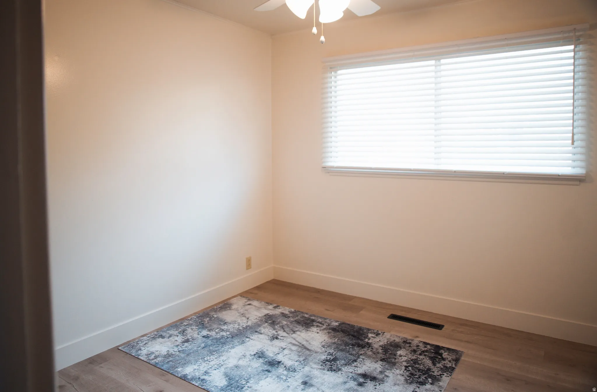 Bedroom currently being used as workout room.