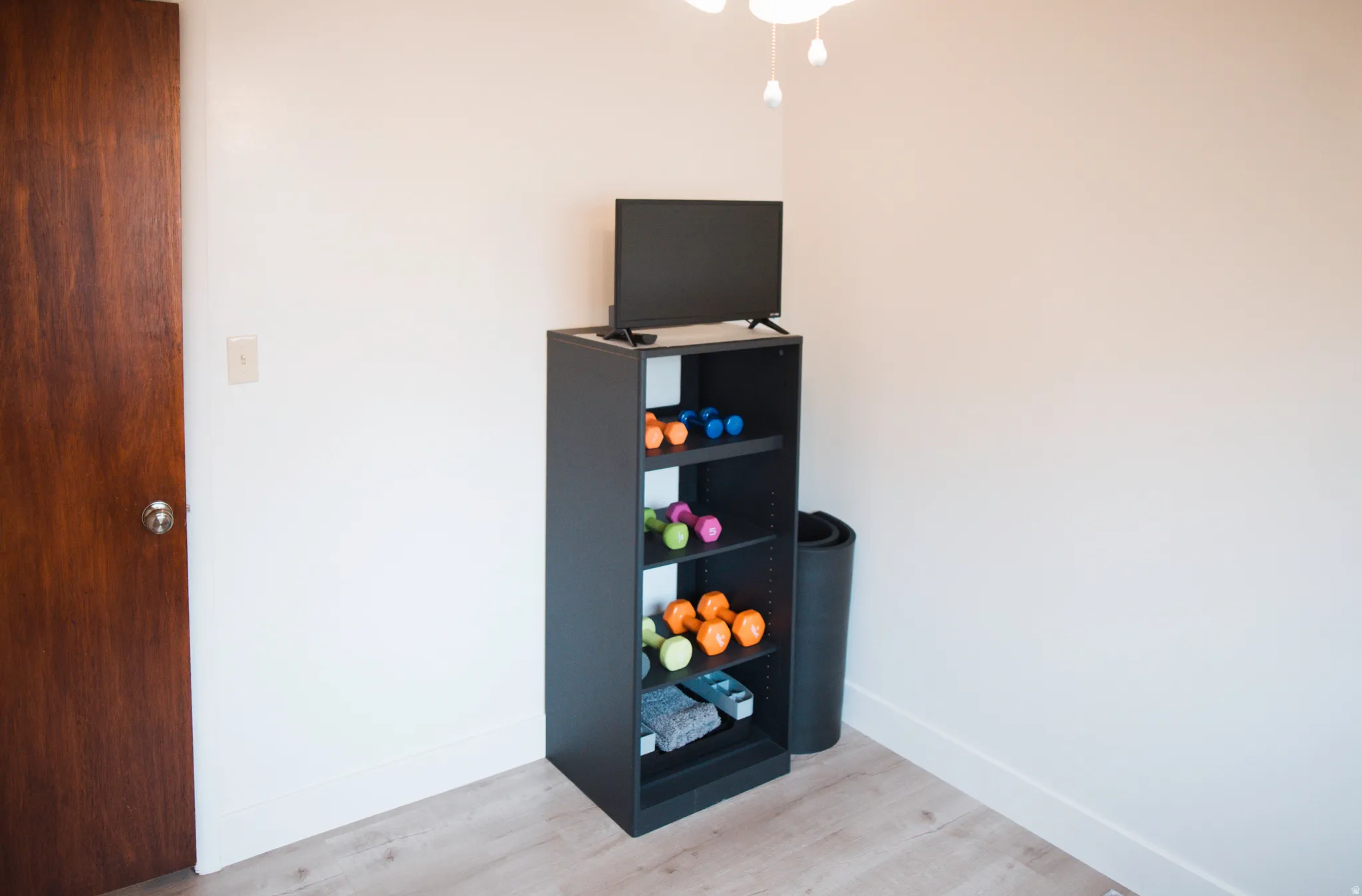 Bedroom currently being used as workout room.